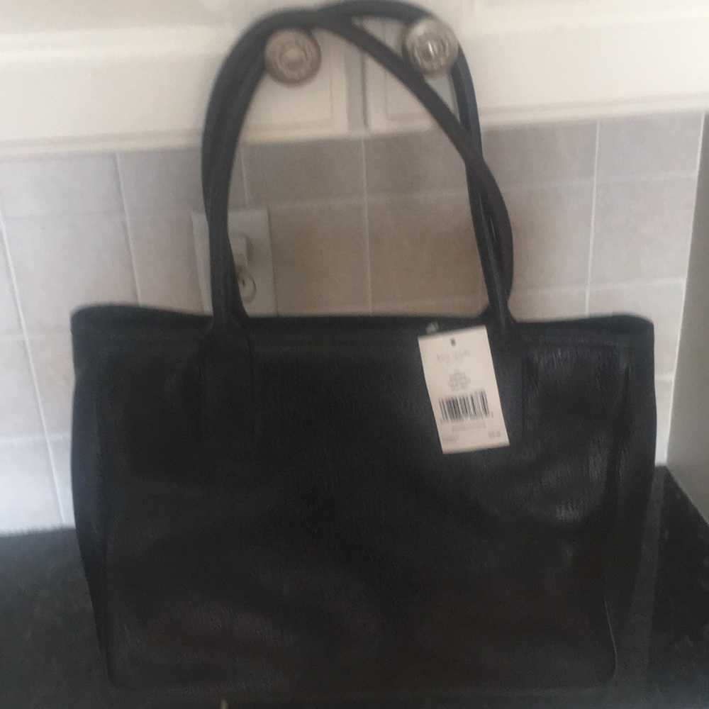Brand new Kate Spade with tags